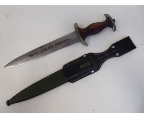 A German Nazi Stormtroopers dagger, the wooden handle bears an NP, EA Spandau Ostern 1937, the Eichhorn blade with a motto&nb