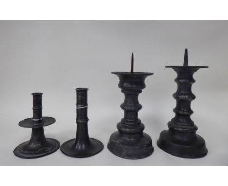 Two similar late 19thC knopped, pricket style pewter candlesticks&nbsp; 8" &amp; 7"h; and two 18th/19thC pewter candlesticks,