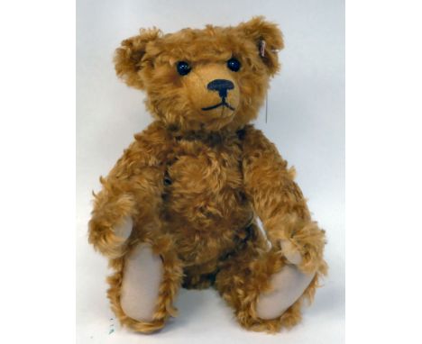 A Steiff ginger coloured mohair Teddy bear with a mobile head and limbs, a stitched nose and growler&nbsp; 13"h