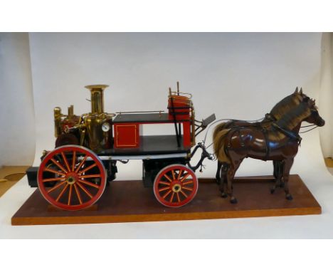 A scratch built scale model, replica of a late 19thC two horse drawn fire engine with 'Metropolitan' inspired coachwork and d