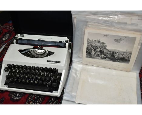 TWO PORTABLE TYPREWRITERS a ring-binder of topographical prints and a boxed metal 50 year calendar, one typewriter is an Adle