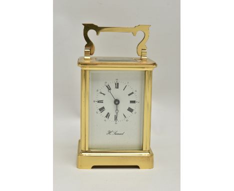 A 'H.SAMUEL' BRASS CARRIAGE CLOCK, key wound, Roman numeral dial, in working order time keeping untested