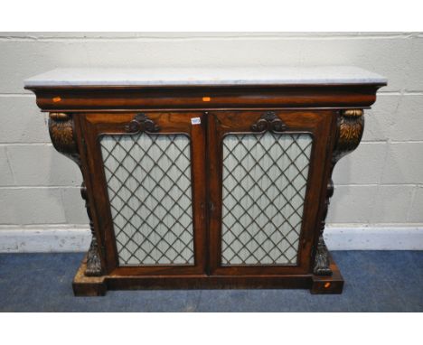 A REGENCY ROSEWOOD TWO DOOR CUPBOARD, with a veined marble top, the cupboard doors with a brass mesh panel flanked by scrolle
