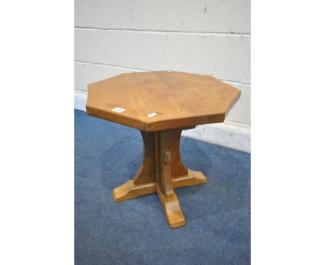 ROBERT 'MOUSEMAN' THOMPSON OF KILBURN, AN EARLY TO MID 20TH CENTURY OAK OCCASIONAL TABLE, the adzed octagonal top on a crucif