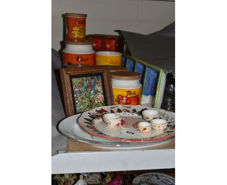 AN ENAMEL ON COPPER PAINTING AND A GROUP OF CERAMICS, comprising a small enamel on copper painting of a grey tabby cat sittin