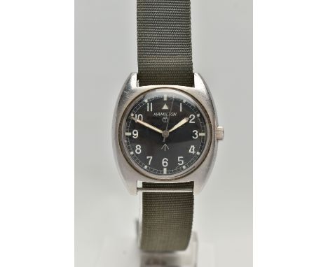 A VINTAGE HAMILTON BRITISH MILITARY ISSUE WRISTWATCH WITH BROAD ARROW SYMBOL, circa 1970's, matt black dial with illuminous A