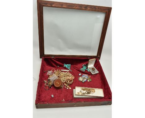 AN ASSORTMENT OF ITEMS, to include an assortment of costume jewellery, together with a large display case, fitted with a glas