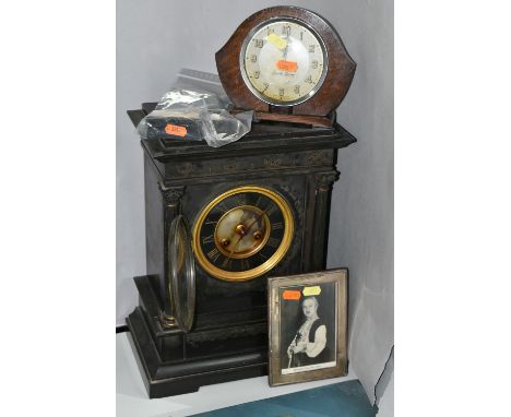A LATE 19TH CENTURY BLACK SLATE CLOCK, engraved decoration to front, two columns, brass bezel, Roman numerals, together with 