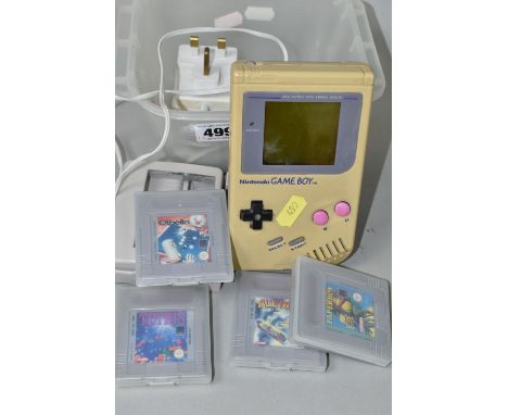 NINTENDO GAME BOY AND GAMES, includes Tetris, Super Mario Land, Paperboy, Othello and Alleyway, included plug is not a Game B