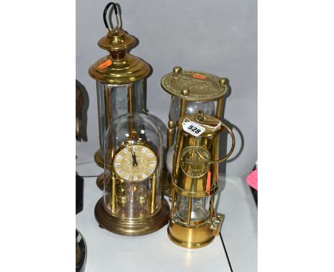 A BRASS TYPE 6 M &amp; Q MINERS LAMP, A LARGE HOUR GLASS IN A BRASS FRAME, height 24cm, a reproduction brass candle holder of