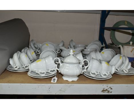 A GROUP OF GERMAN HUTSCHENREUTHER 'SYLVIA' DESIGN WHITE TEAWARE, comprising twelve breakfast cups, fourteen saucers, twelve t