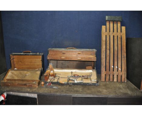 TWO VINTAGE WOODEN CARPENTERS TOOLBOXES AND A CRAWLER BOARD including two hand braces, various chisels and gouges by Sorby an