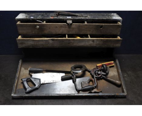 A VINTAGE WOODEN ENGINEERS TOOLBOX containing various tools to include saws, chisels, files etc..