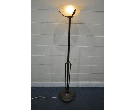 AN ART DECO METAL STANDARD LAMP, with a Lalique style frosted glass shade, on a circular base, and triple claw feet, height 1