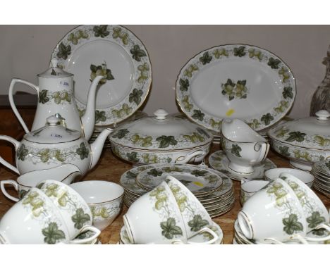 A SIXTY FIVE PIECE ROYAL WORCESTER 'THE WORCESTER HOP - MATHON' DINNER SERVICE, comprising two tureens, three meat plates, a 