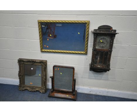 A 19TH CENTURY FOLIATE GILT FRAMED WALL MIRROR, along with a Regency flame mahogany swing mirror, a mahogany wall clock and a