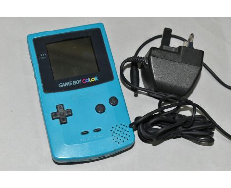 NINTENDO GAMEBOY COLOR, includes Tetris Blast, game and console have been tested and are in working condition, charger untest