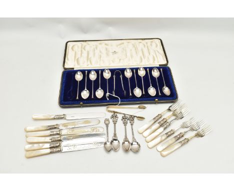 A CASED SET OF ELEVEN GEORGE V SILVER RAT TAIL PATTERN SEAL END TEASPOONS AND MATCHING SUGAR TONGS, engraved initial 'H' top 