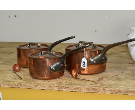 THREE GRADUATING FRENCH COPPER SAUCEPANS, with lids, all stamped 'Made in France', diameters 18cm, 16cm and 14cm, together wi
