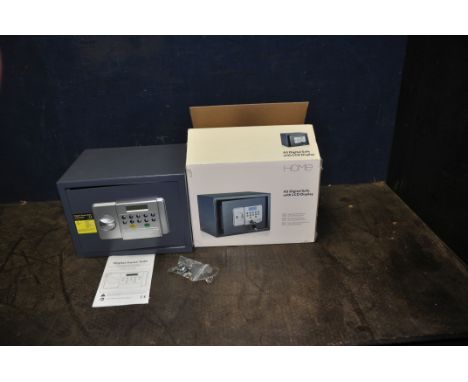 A HOME A5 DIGITAL SAFE with original box, two keys, manual and batteries width 35cm x depth 25cm x height 25cm