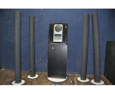 A BANG AND OLUFSEN BEOSOUND 3200 HI FI and stand with four Beolab 6000 Powerlink tower speakers and three B&amp;O remotes (al