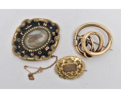 THREE LATE VICTORIAN BROOCHES, the first a gold knot brooch, fitted with a base metal pin and c clasp, unmarked, approximate 