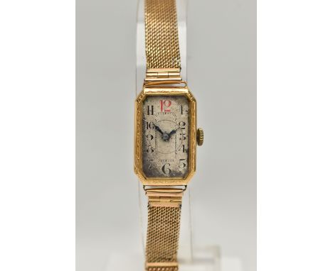 AN EARLY 20TH CENTURY LADYS GOLD WRISTWATCH, manual wind requires attention, rectangular discoloured dial, Arabic numerals wi