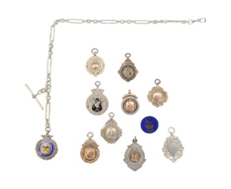 Early 20th century silver enamel fob medallion, on a silver fancy link watch chain, together with nine other silver fob medal