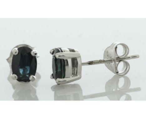 These 9ct white gold stud earrings have an oval 6mm x 4mm sapphire in a four claw setting. Item Specifications: Clarity: . Me
