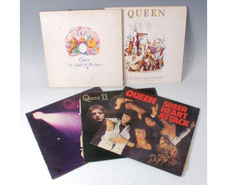 A collection of five Queen vinyl records to include Queen, Queen 1973 EMI 3006, Queen II EMI 767, Sheer Heart Attack, EMI 306