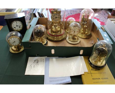 A skeleton clock under glass dome, six smaller examples, a Victorian mantel clock in ebonized case and a selection of clock k