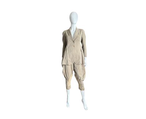 A 1930s riding habit composing of tailored jacket and elephant ear jodhpurs. Made from a lightweight wool,&nbsp; the jodhpurs