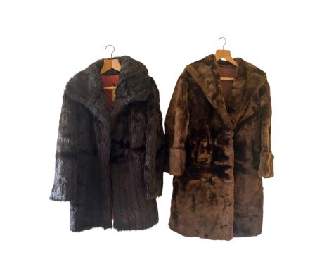 A vintage men's sheepskin jacket, made in Malta, sz 40, along with a women's faux fur jacket and a beaver lamb coat plus a pa