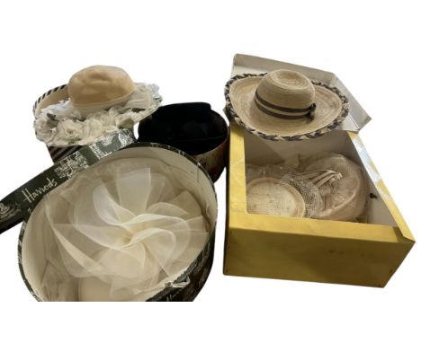 A group of vintage hats C1970s and 80s to include a Windsmoor derby hat in black felt, a wide brimmed straw had with braided 