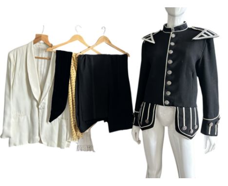 A group of vintage menswear to include a Scottish pipers uniform doublet, a pair of very high waisted military or band trouse