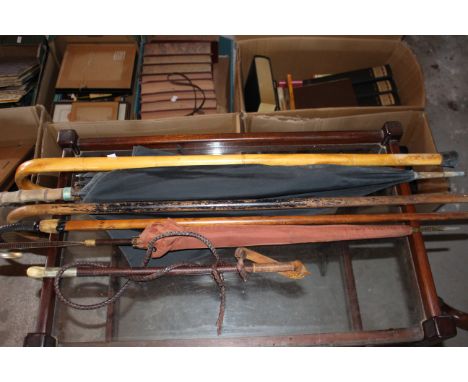 Selection of sticks to include carriage whip, vintage umbrella, &amp; goat horn/Hoof walking cane&nbsp;