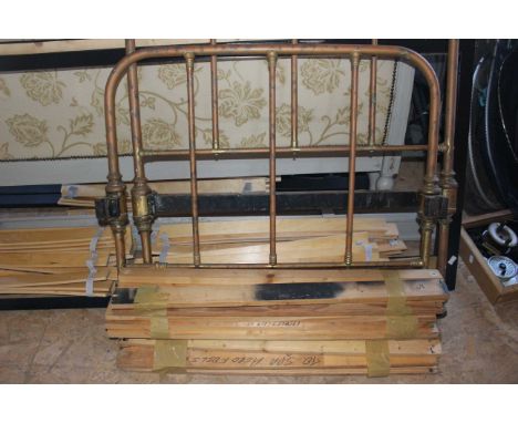 Single copper framed bedstead with side rails and slats.
