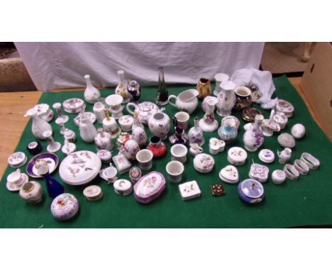 A collection of ceramics to include Dresden, Royal Albert, Aynsley etc.. Tea pots, ceramic eggs, sugar bowls, pill/snuff boxe