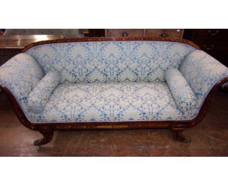 A regency style mahogany sofa settee. With blue stylised dragon/dogs upholstery. One leg detached other legs may need work. O