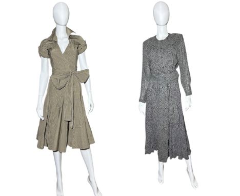 A group of mostly 1980s womenswear with some later to include a Max Mara skirt with peplum blouse a Diane von Furstenberg wra