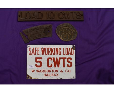 A selection of industrial crane badges including enamel cast iron and brass