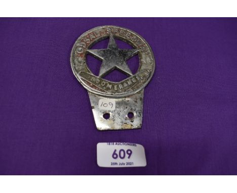 A motor car engine badge for the Odsal Speedway Boomerangs motor cycles