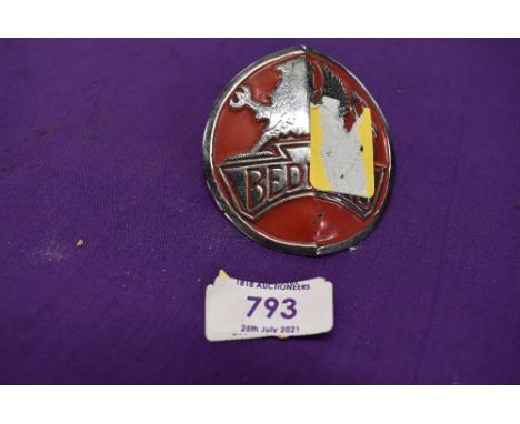 A vintage motor car engine hood badge for Bedford