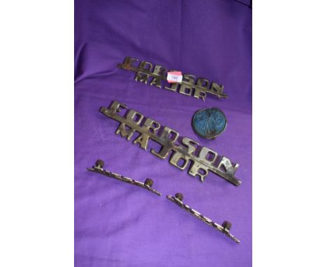A selection of Fordson Major engine badges