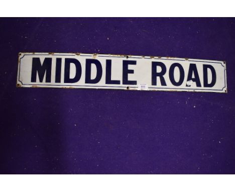 A vintage road side enamel sign reading Middle Road