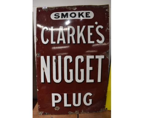A genuine enamel advertising sign for Clarke's Nugget Plug tobacco