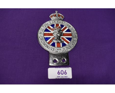 A coronation motor car engine badge dated 1953