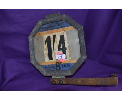 A vintage garage petrol pump price sign for BP British Petroleum and Shell Mex