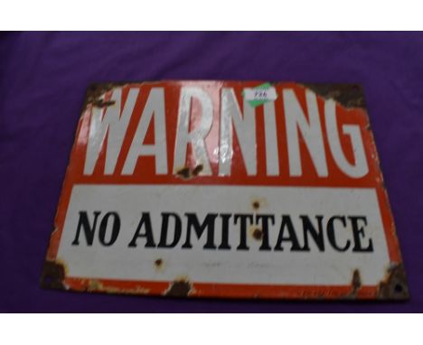 A vintage enamel garage sign for Warning No Admittance