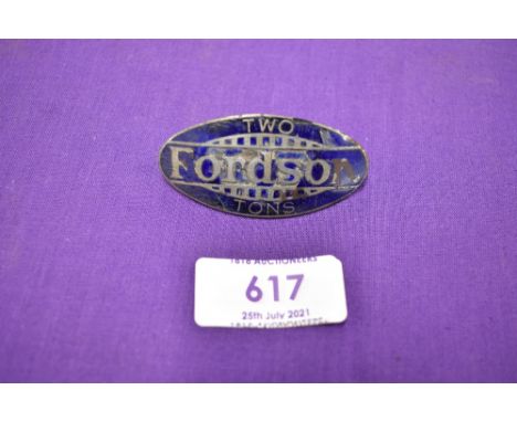 A vintage enamel motor truck badge reading Fordson Two Tons